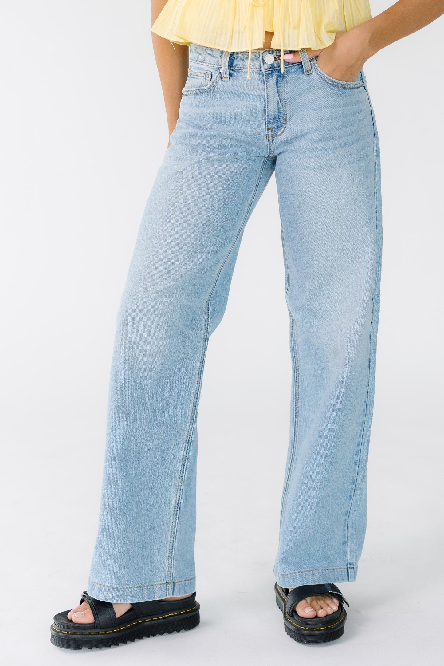 Low Rise Baggy Denim Jeans in light denim for women and men.