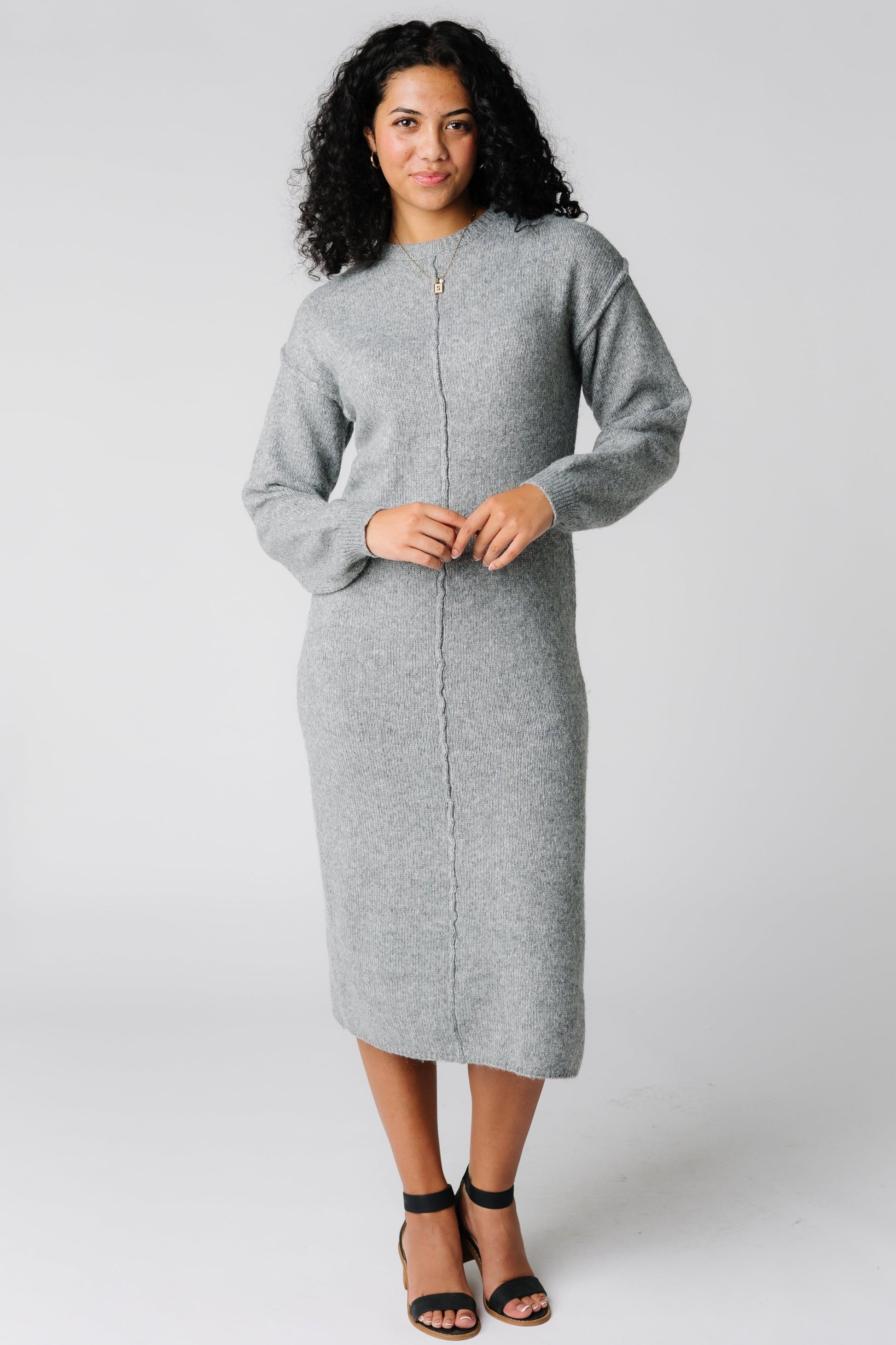 Modest light grey long sleeve sweater dress with crew neckline and midi length