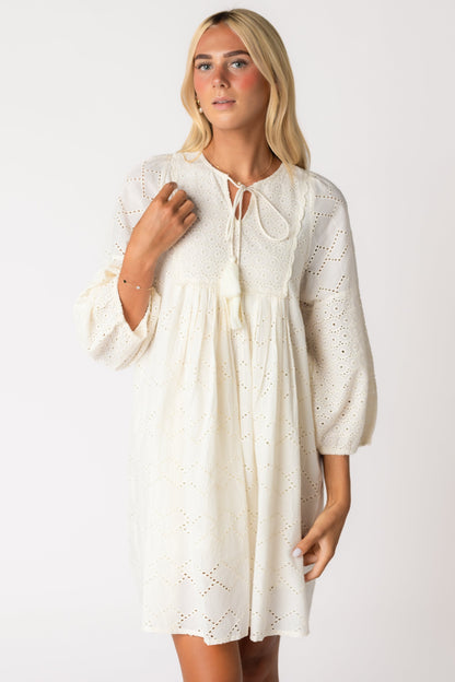 Citrus Cherish Eyelet Tunic  with notched neckline and ties with tassels