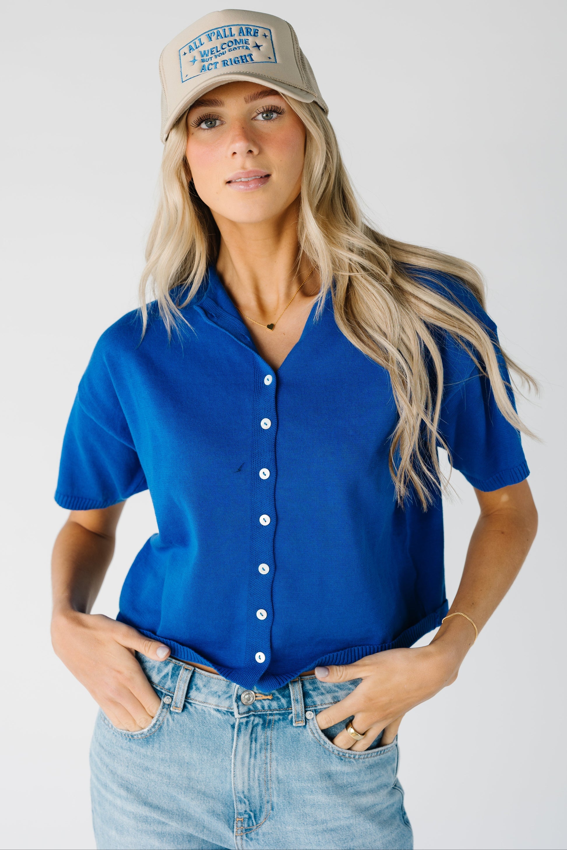 Modest women's blue button down knit top with short sleeves
