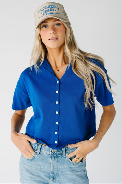 Modest women's blue button down knit top with short sleeves