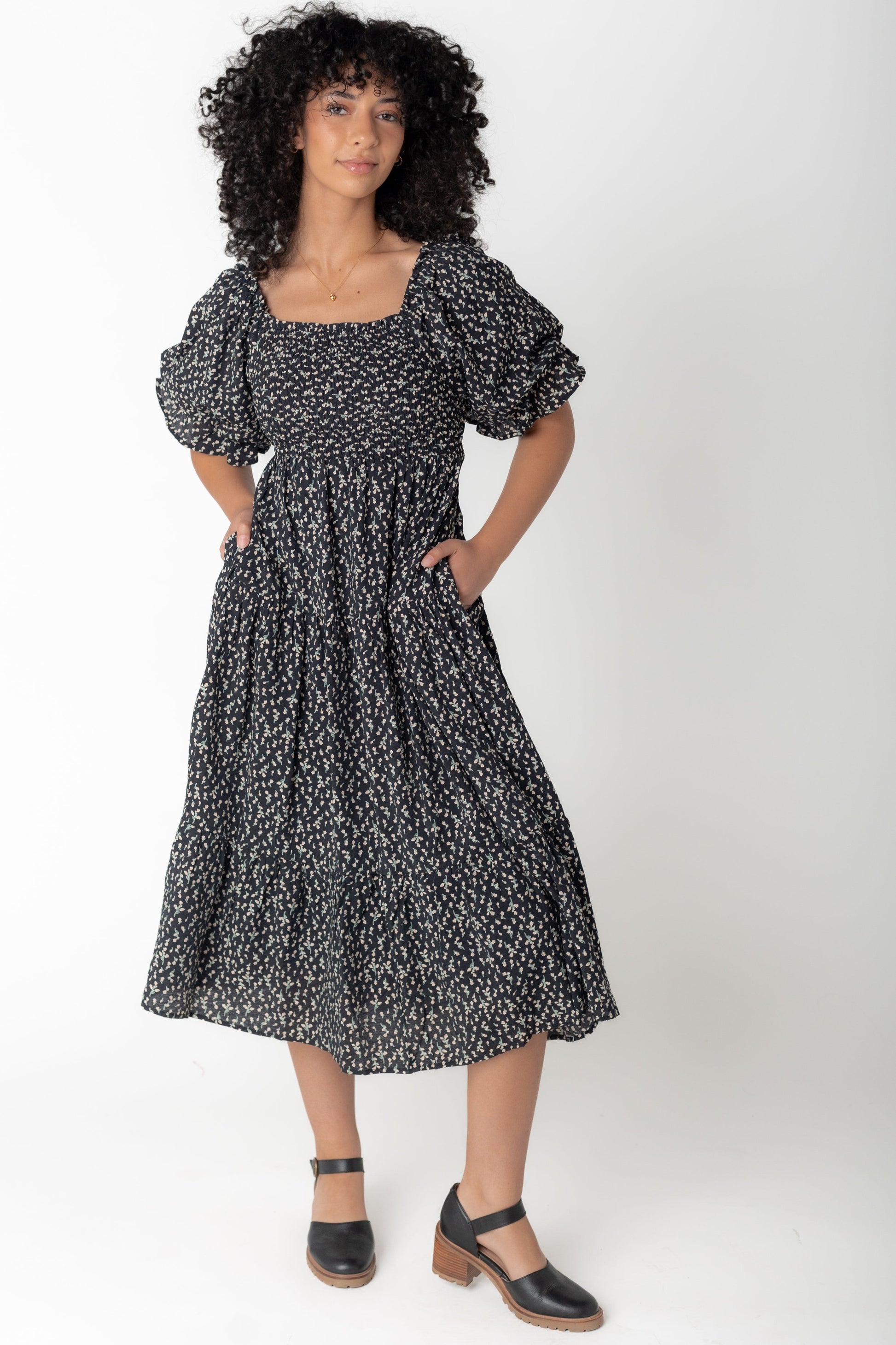 Modest Brass and Roe black floral print midi with smocked front and back bodice