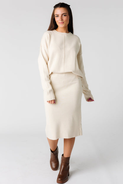 Long sleeve sweater with crew neckline and knee length sweater pencil skirt in oatmeal