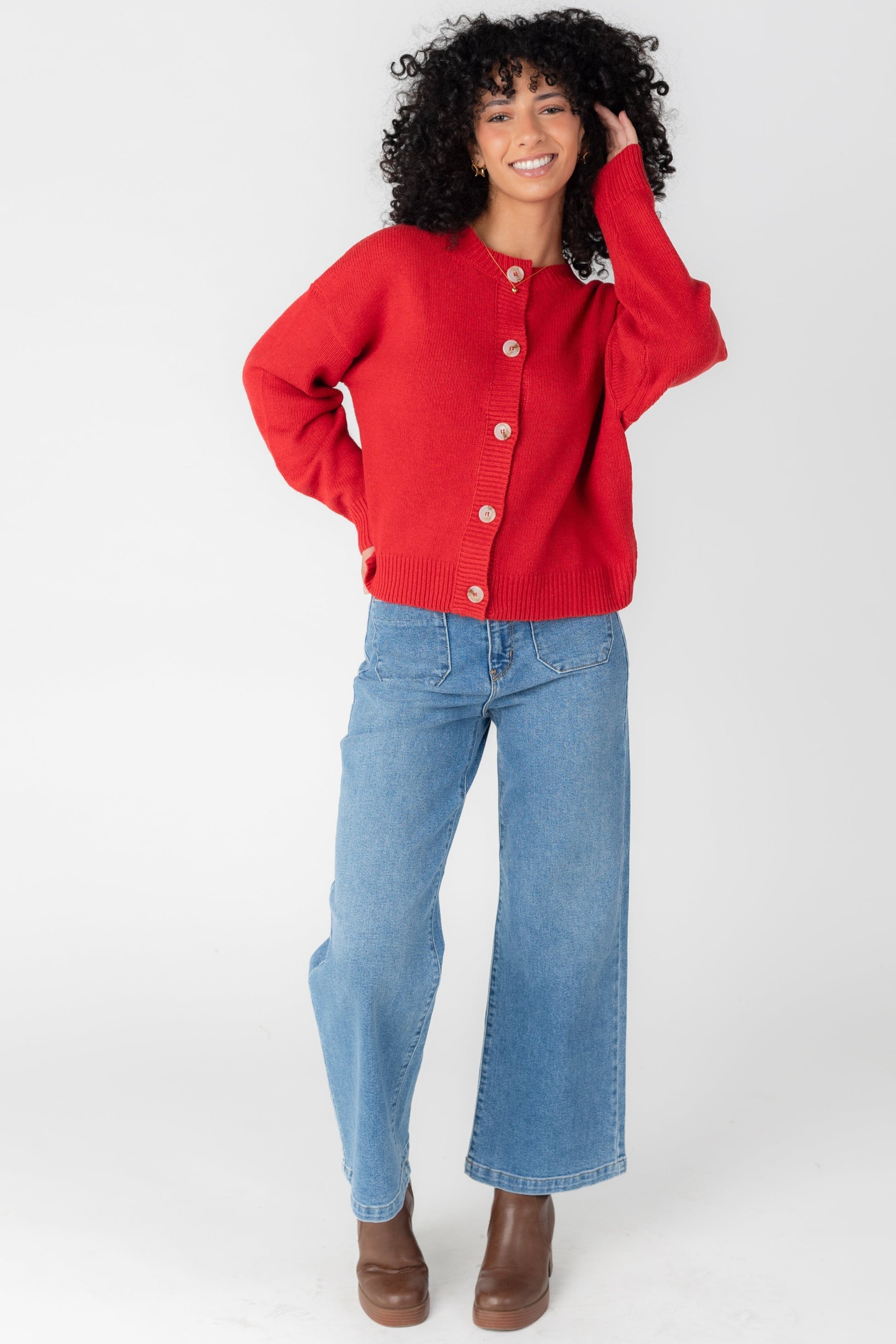 Adrian red button cardigan with crew neckline and long sleeves