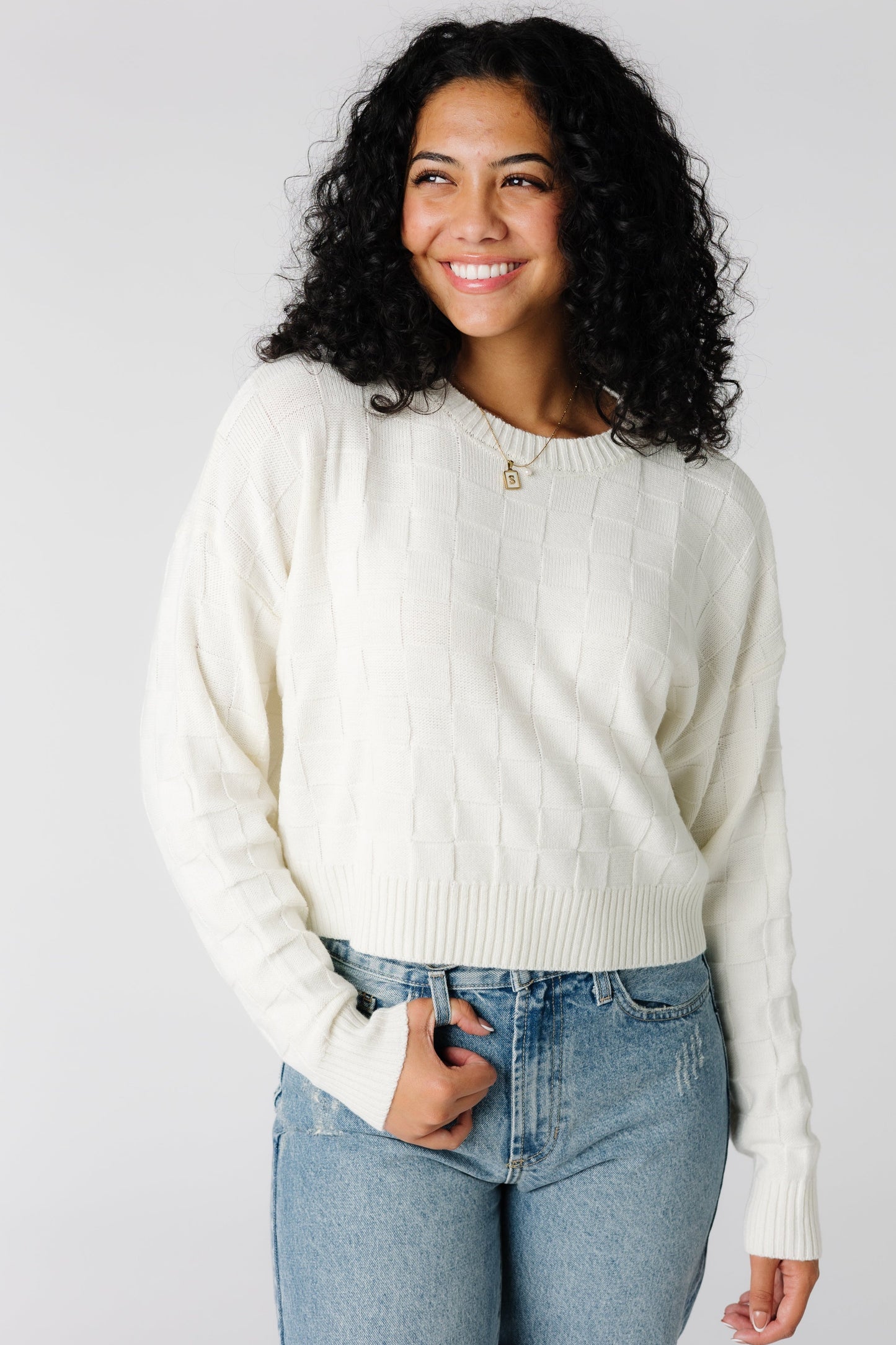 Cream long sleeve sweater with square patterned texture