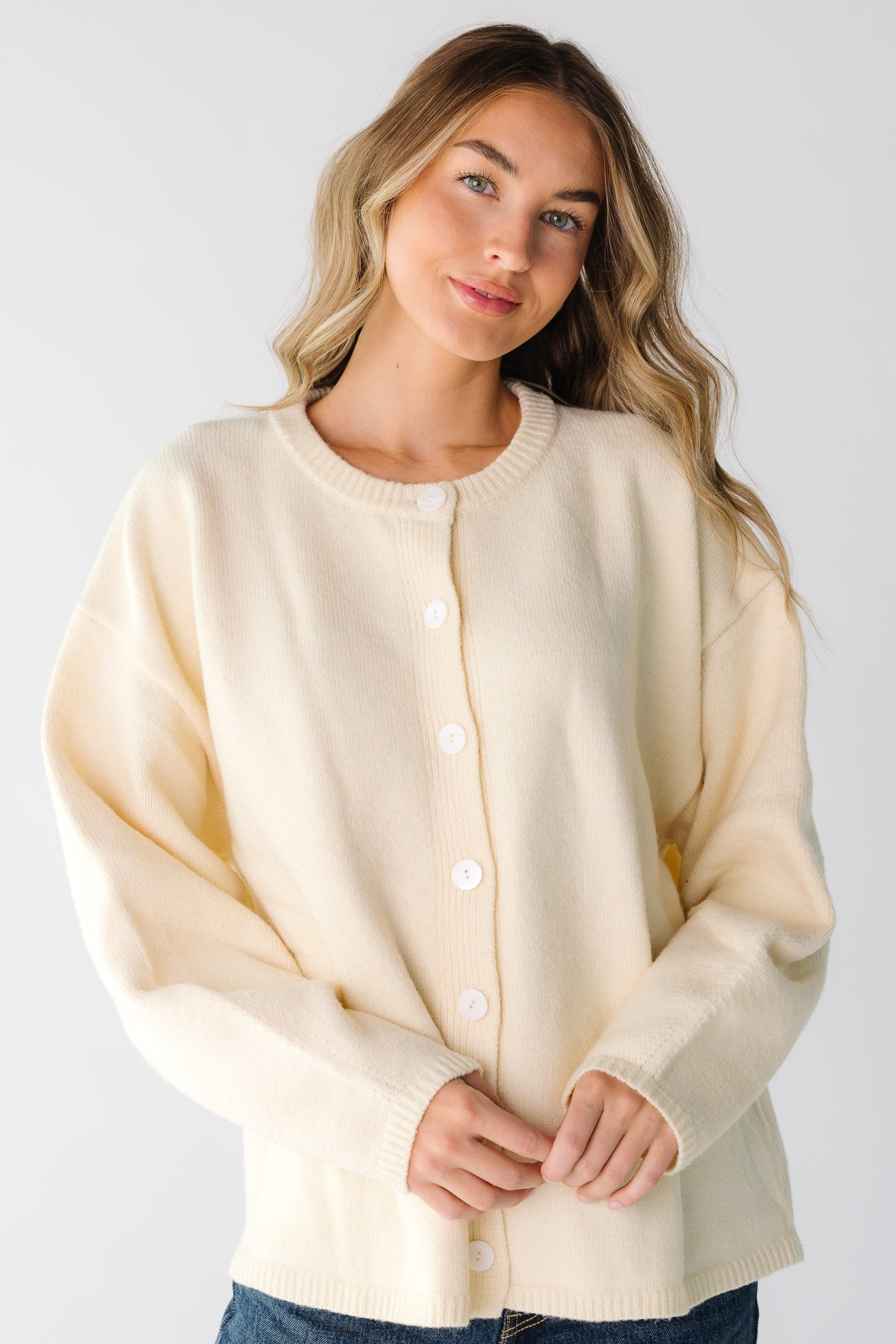 Modest women's button down cardigan in butter cream