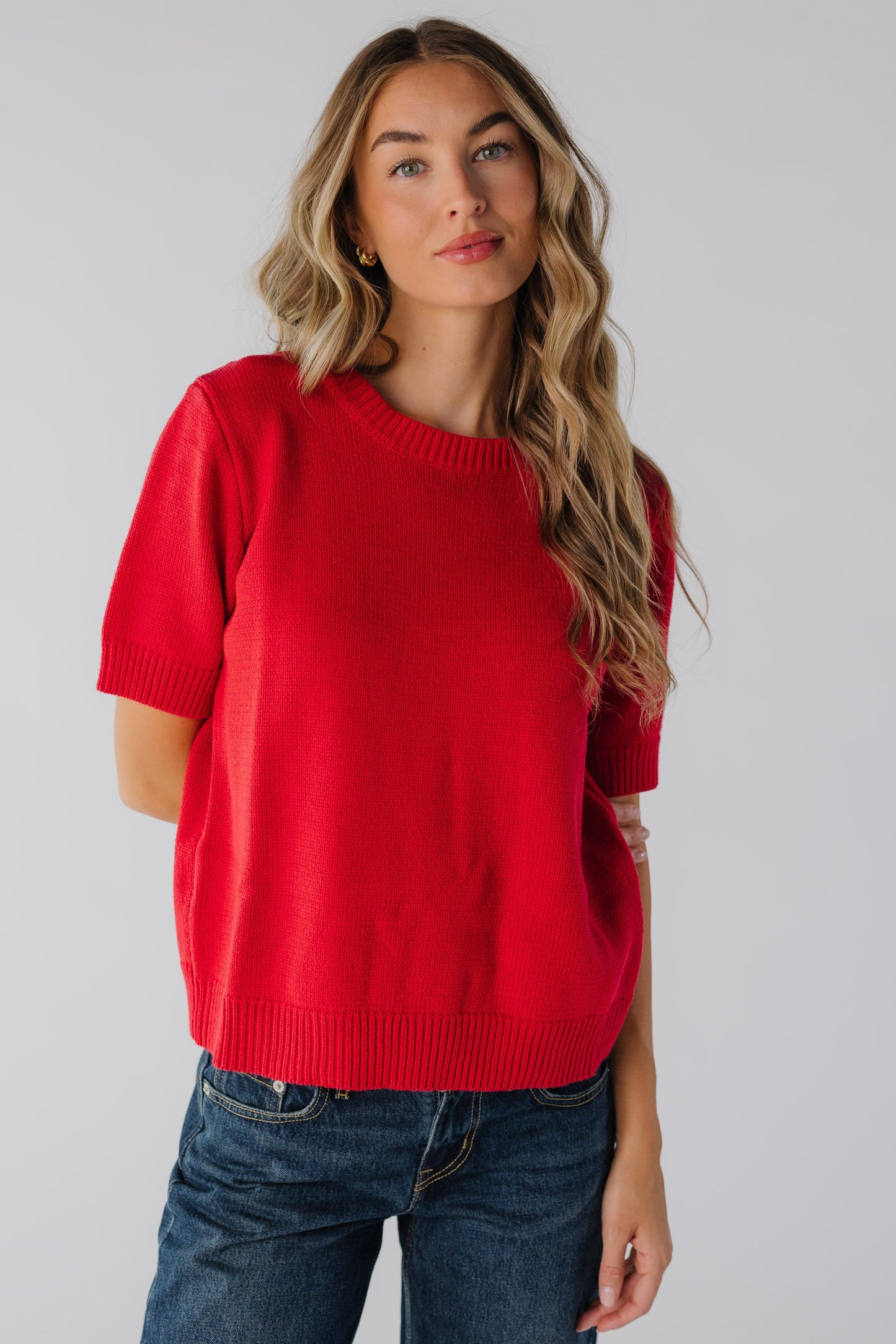 Modest women's red sweater with crew neckline and short sleeves