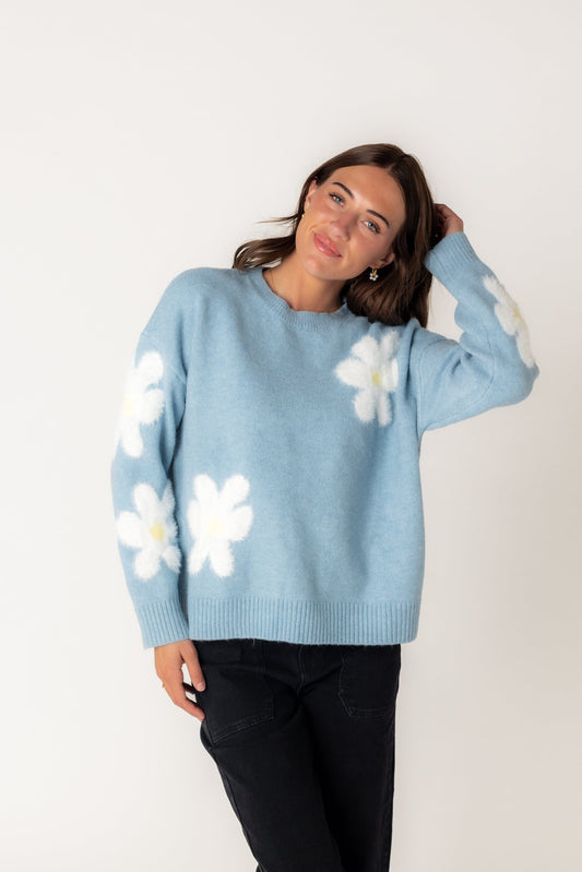 Light Blue crewneck sweater with large scattered daisy pattern