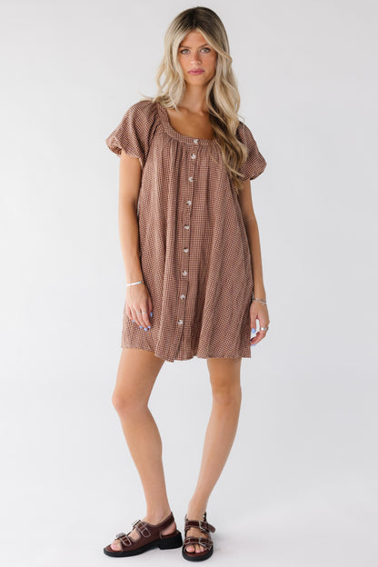 Modest women's button down gingham dress with scoop neckline and short sleeves