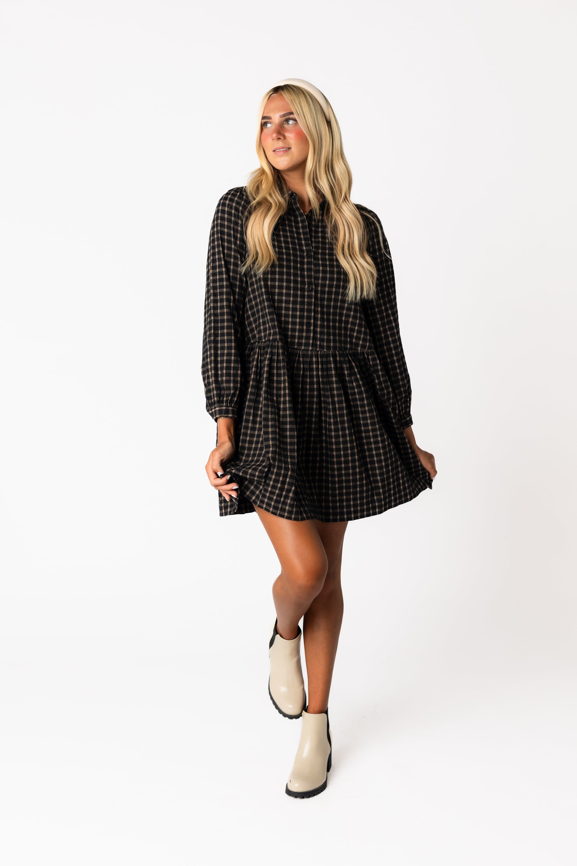 Above knee dress with long sleeves and gathered waist