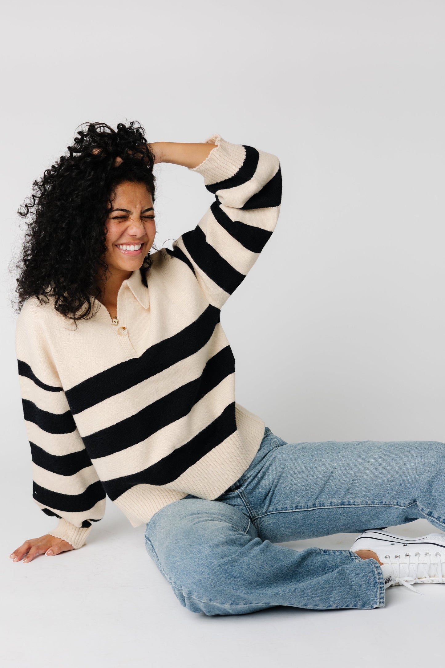 Modest cream and black wide stripe sweater with long sleeves and pointed collar