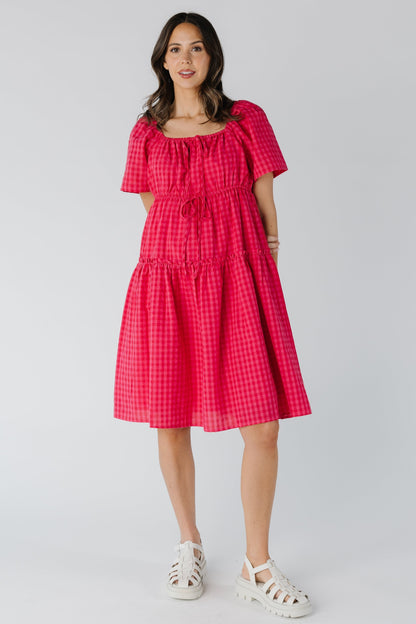 Fuchsia gingham dress with elastic square neckline and short sleeves with elastic waist