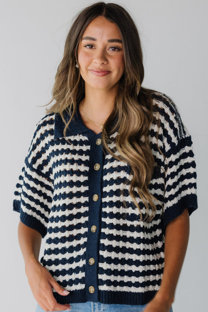 Modest navy and white cardigan with V-neckline and short sleeves