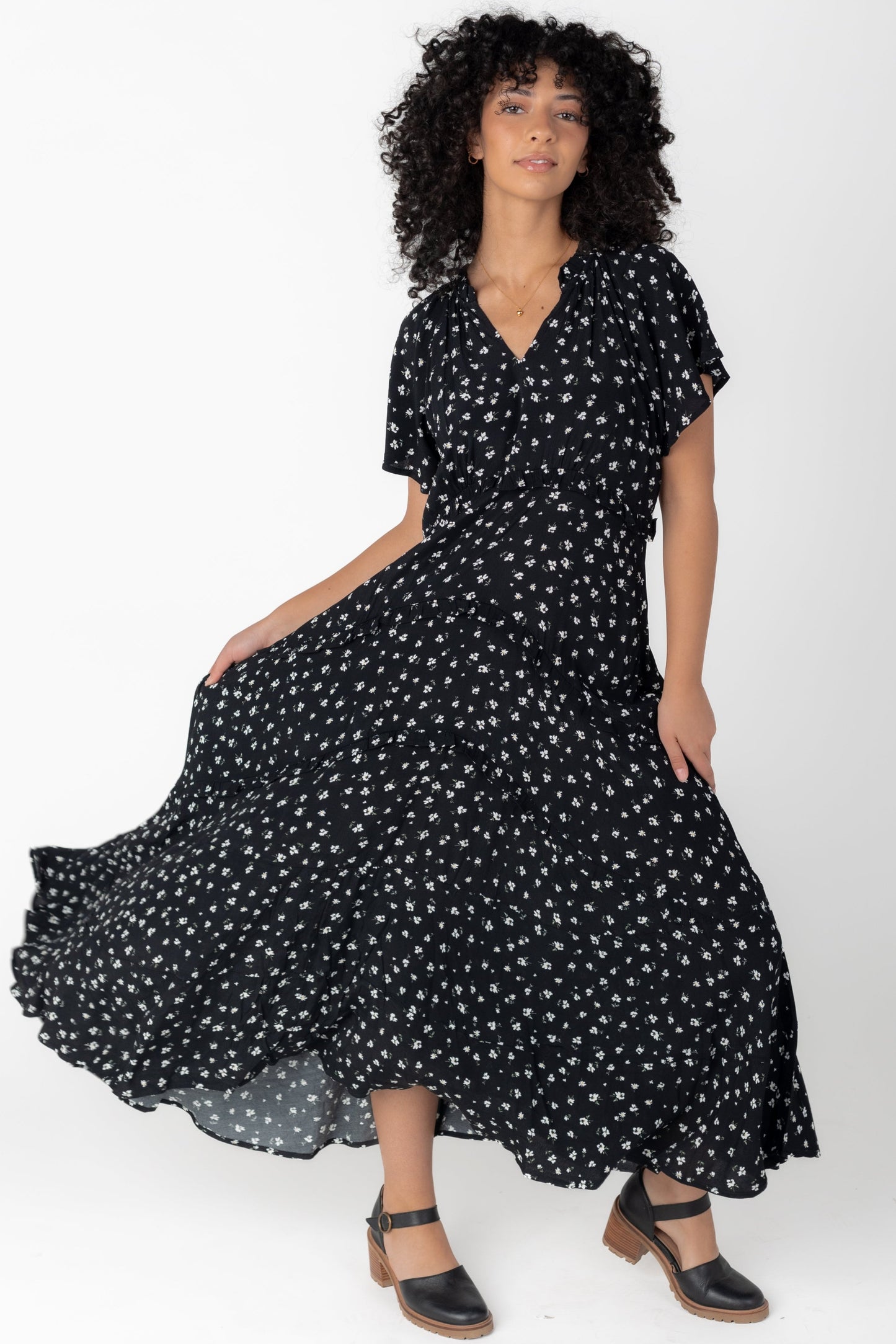 Modest V-neck midi dress with short sleeves and full skirt