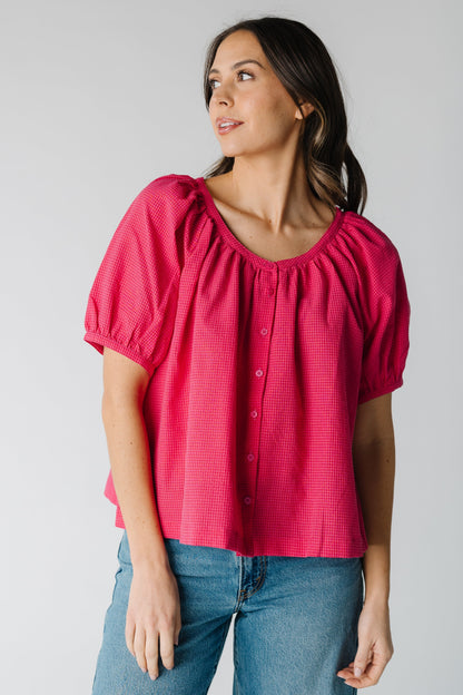 Modest bright pink gingham top with round neckline with short puff sleeves