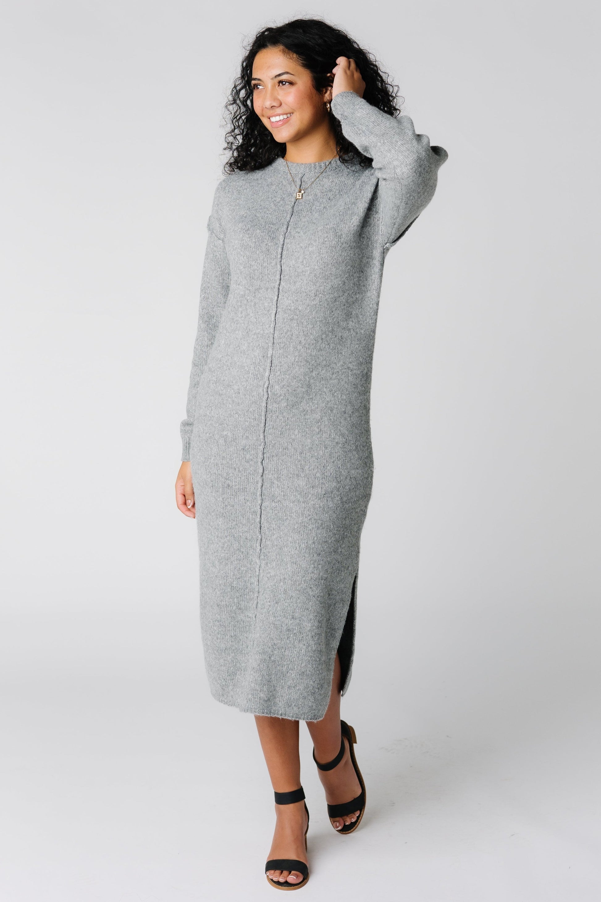 Light grey long sleeve sweater dress with long sleeves and single side slit