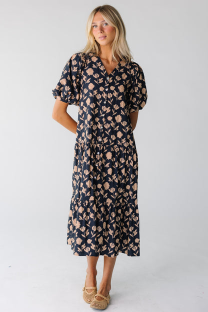 Modest women's midi dress with V-neckline and short sleeves in navy print
