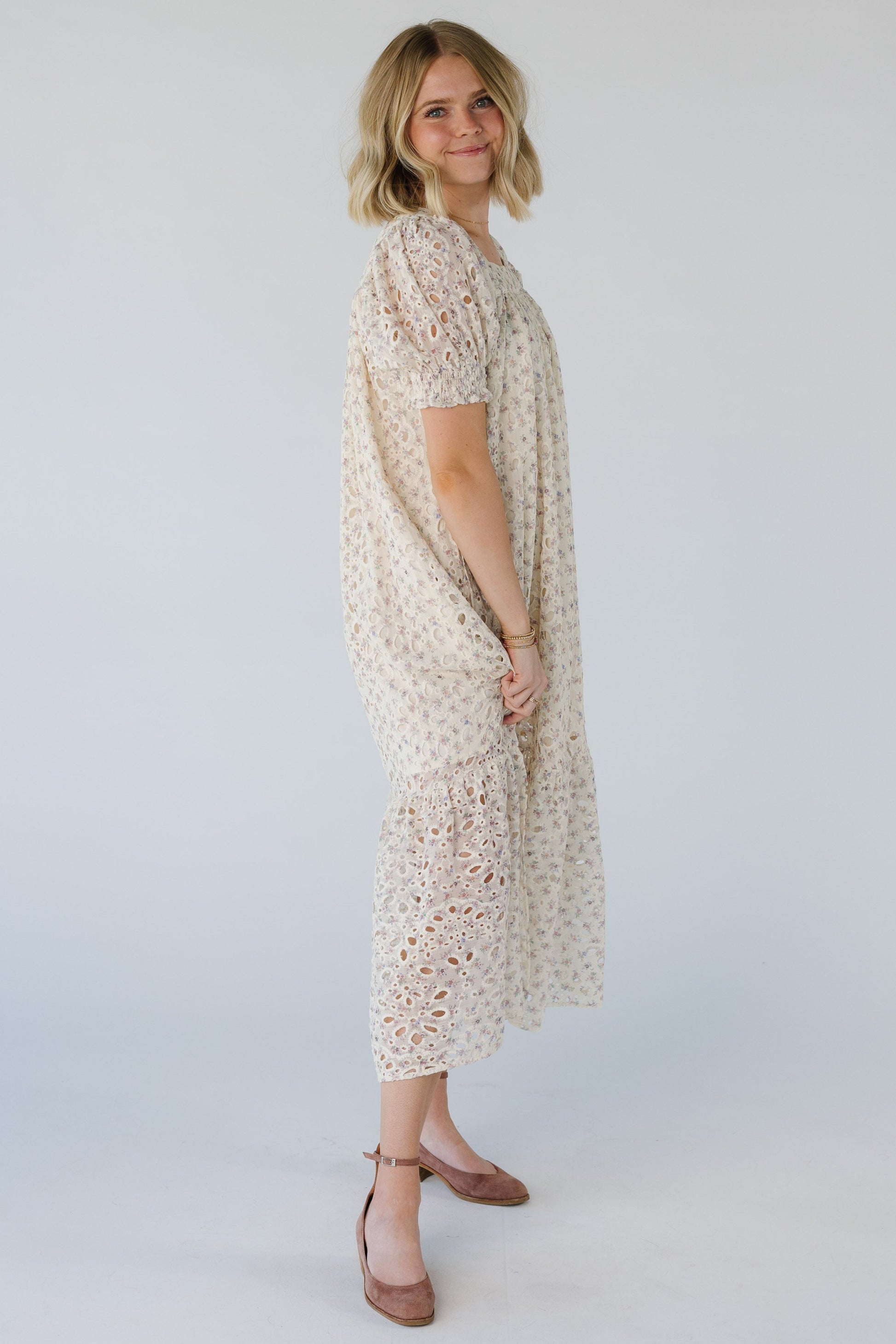 Side view of ivory eyelet midi