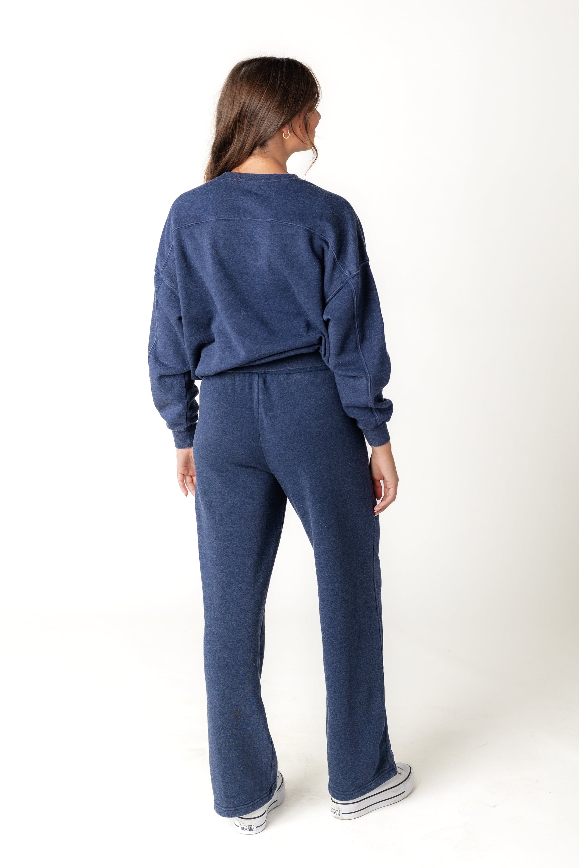 Back view of blue long sleeve sweat set with wide legs