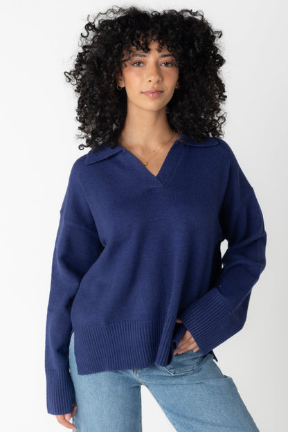 Navy V-neck sweater with pointed collar and long sleeves