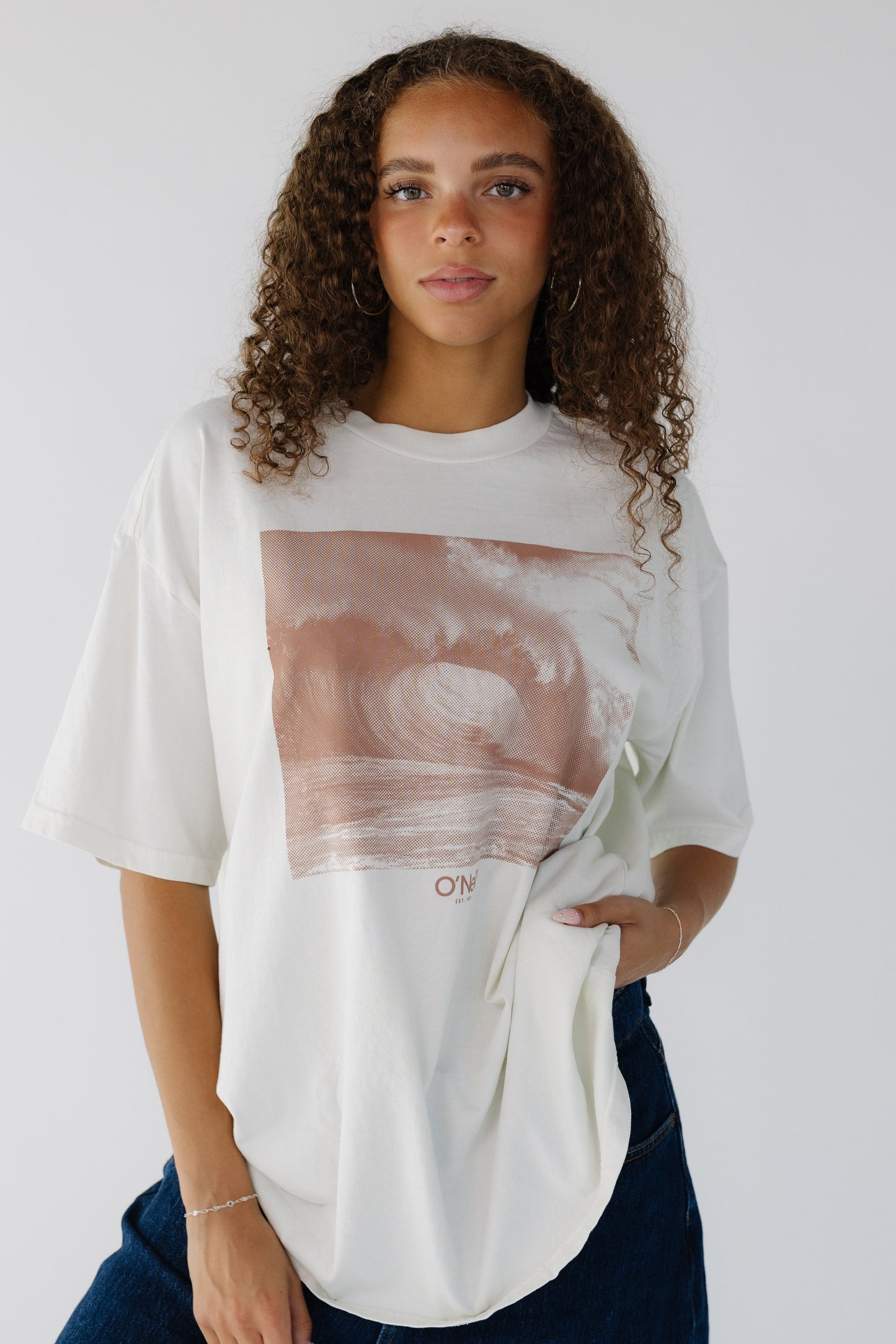 O'Neill OG Wave Tone Oversized Tee in light cream with a large front brown graphic.  SU2641801
