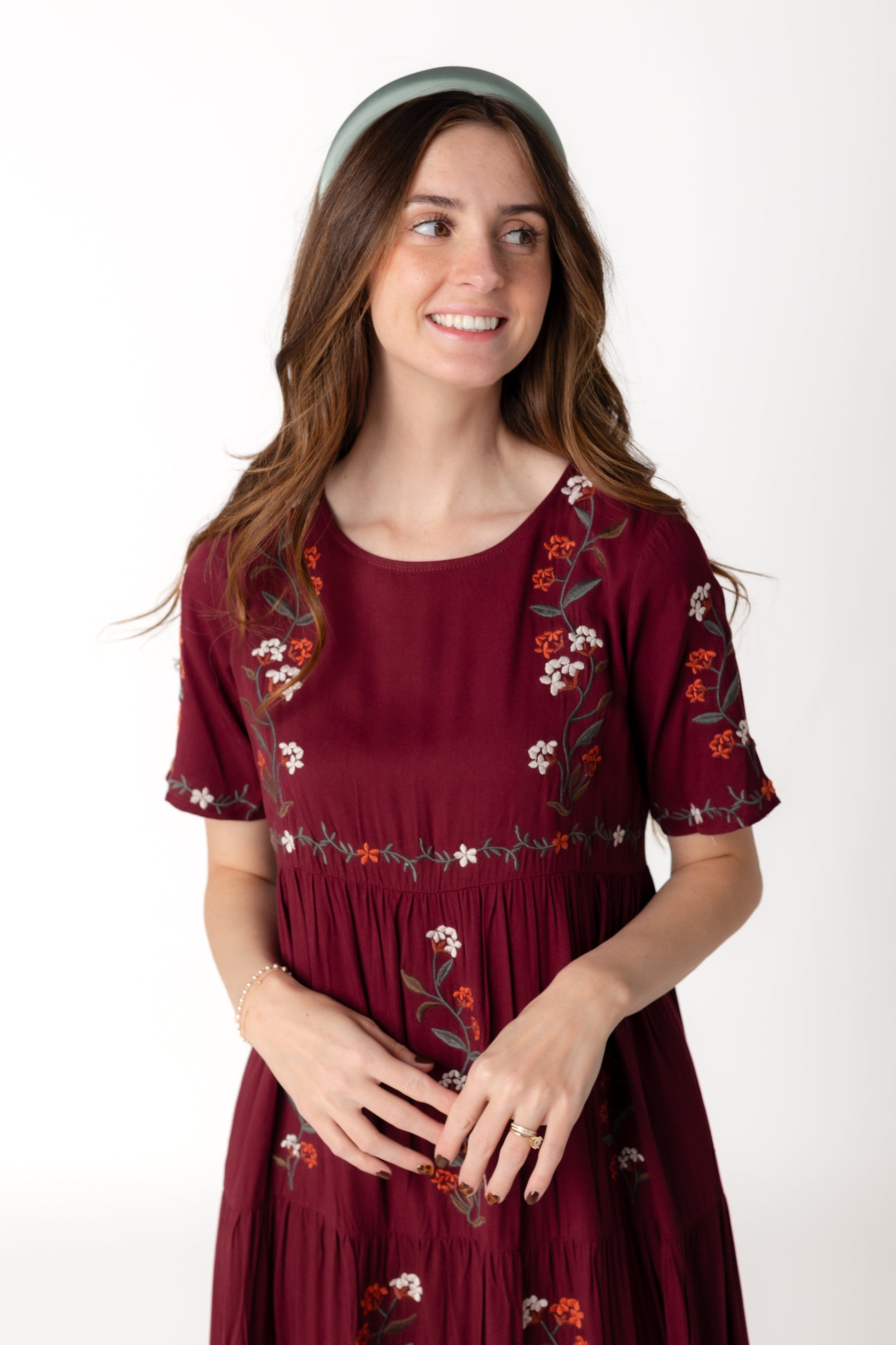 Modest plum embroidered dress with round neckline