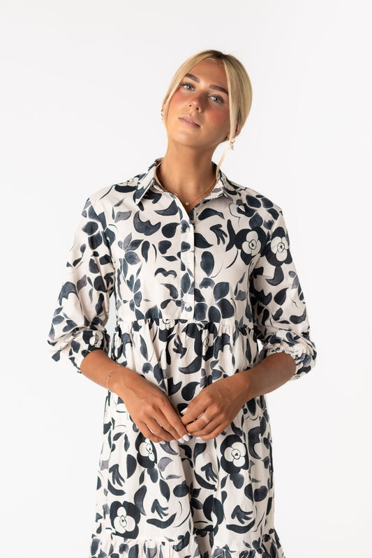 Modest bold floral print dress with button down bodice and longer sleeves