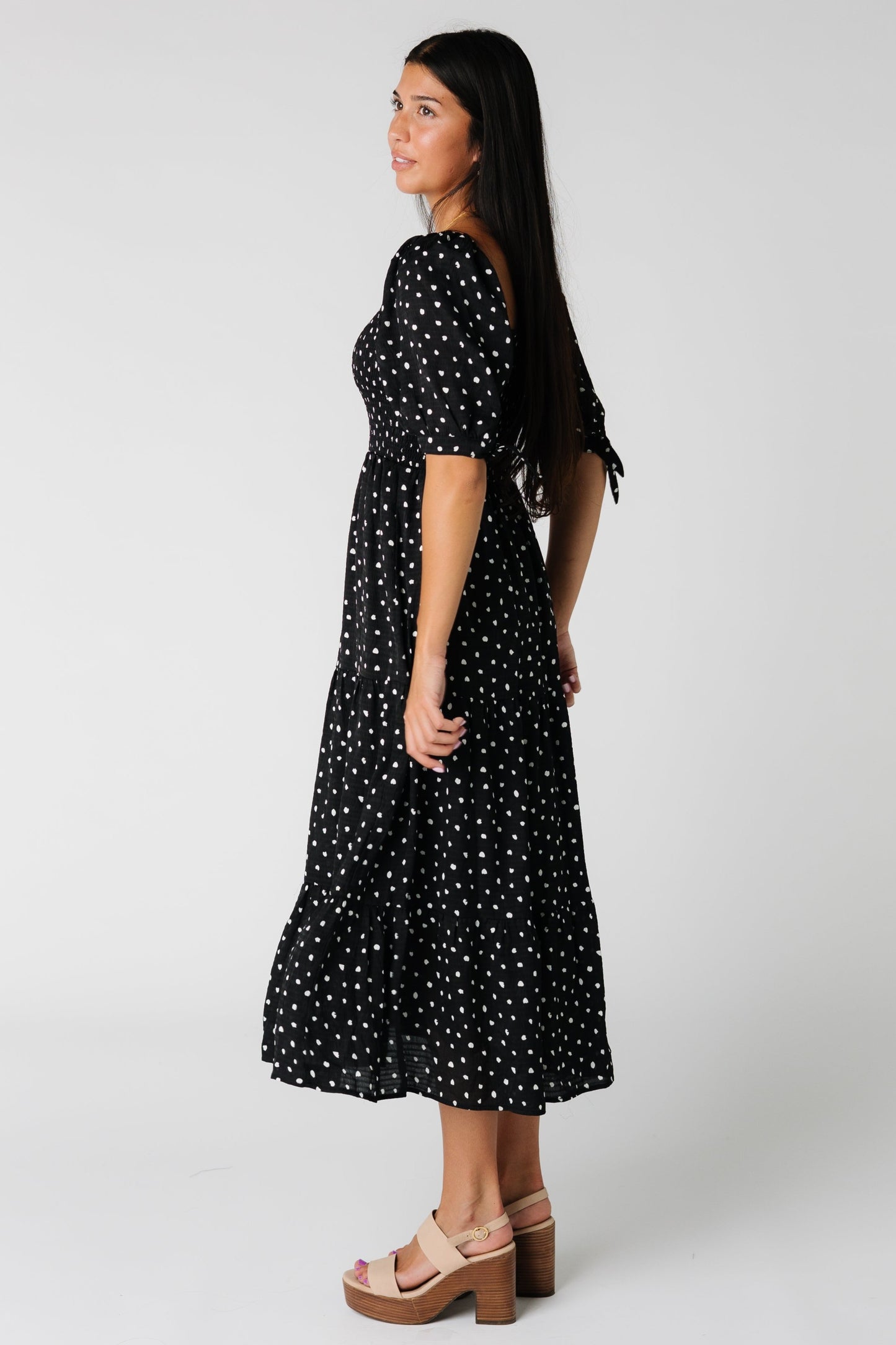 Side view of short sleeve print midi dress