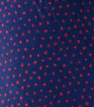 Dark purple floral print fabric swatch.