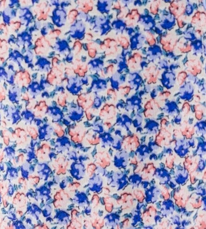 Purple floral print fabric swatch.