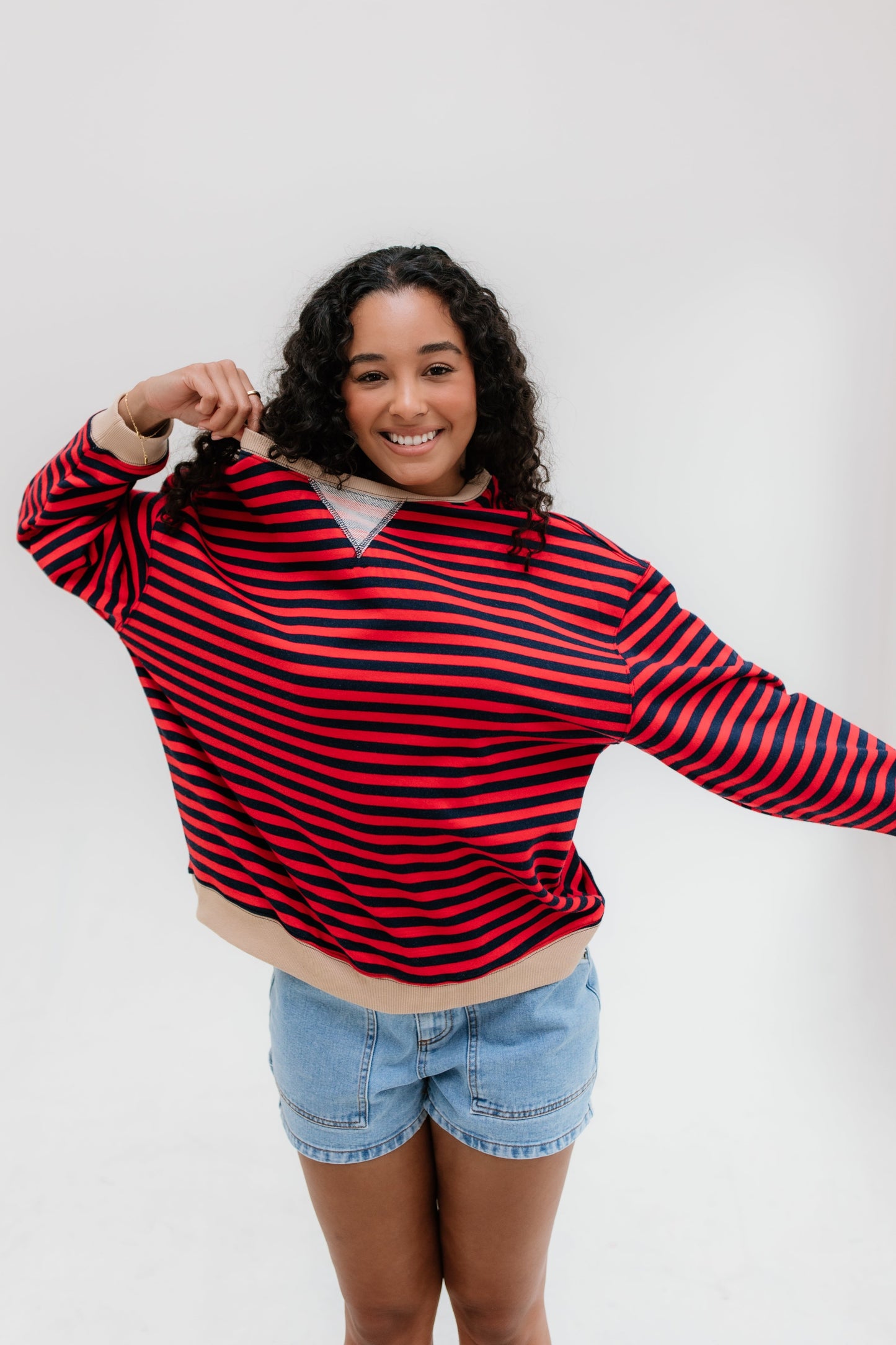 Modest red and navy stripe sweatshirt with crew neckline