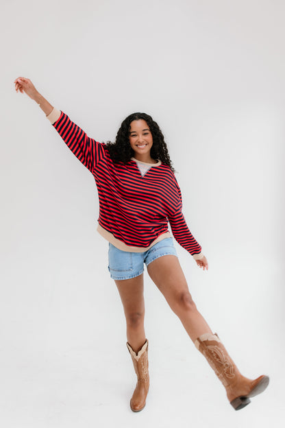 Red and navy stripe top with long sleeves