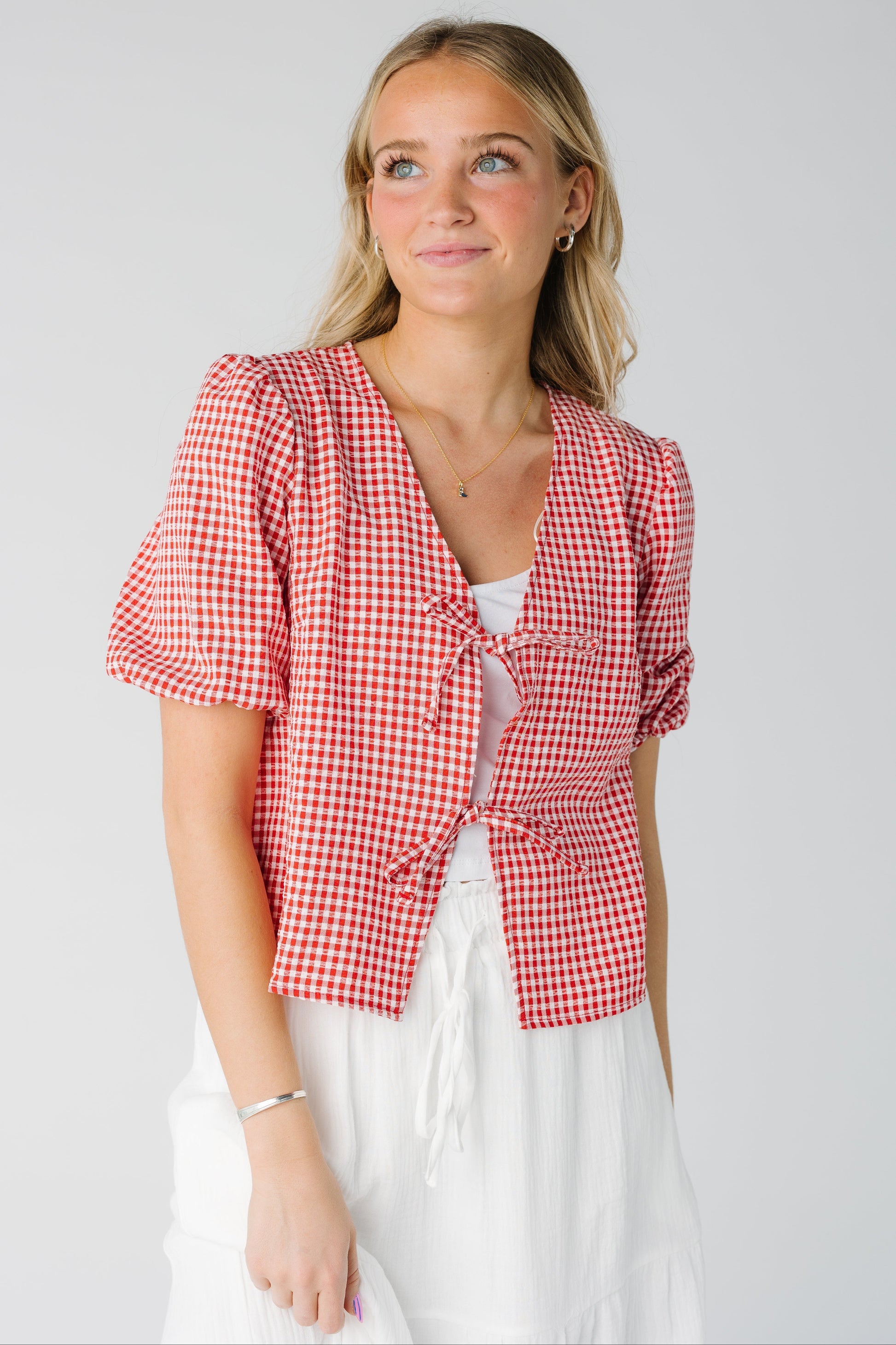 Red and white puff sleeve open top with 2 tie closure