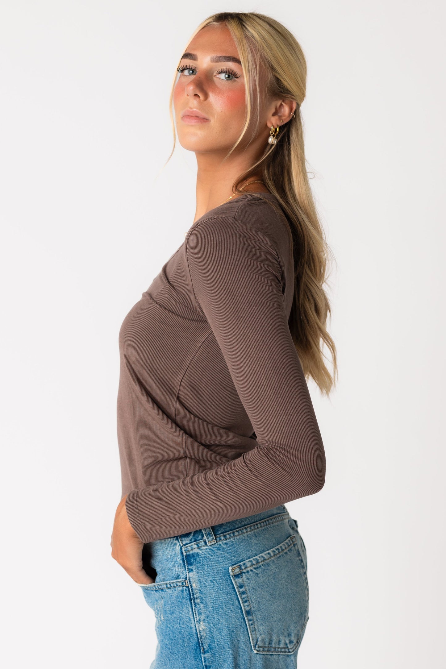 Side view of brown long sleeve tee