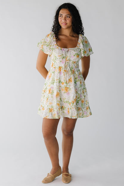 Ivory floral midi dress with elastic waist and short sleeves