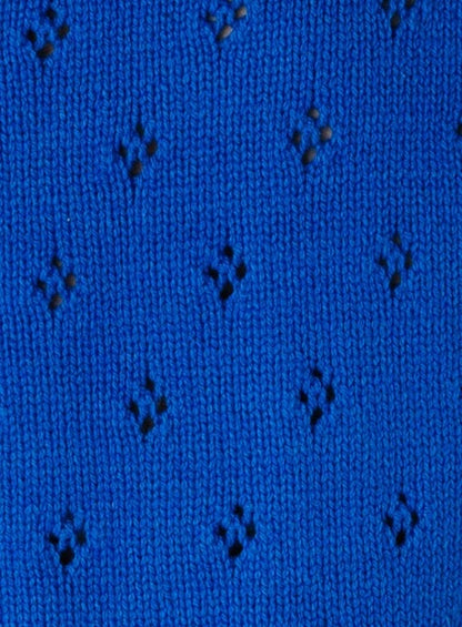 Royal blue eyelet knit fabric swatch.