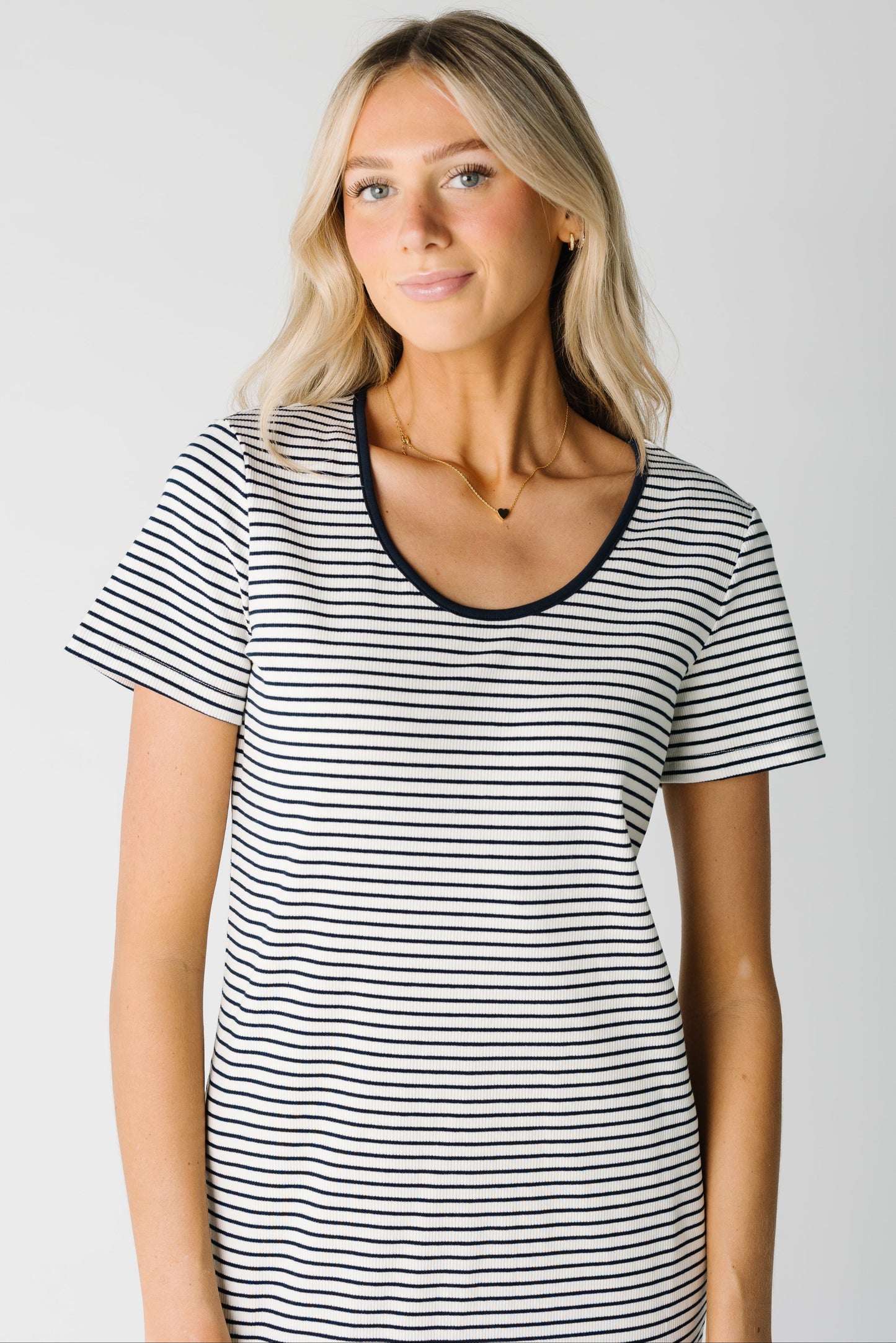 Close view of scoop neck striped tee dress