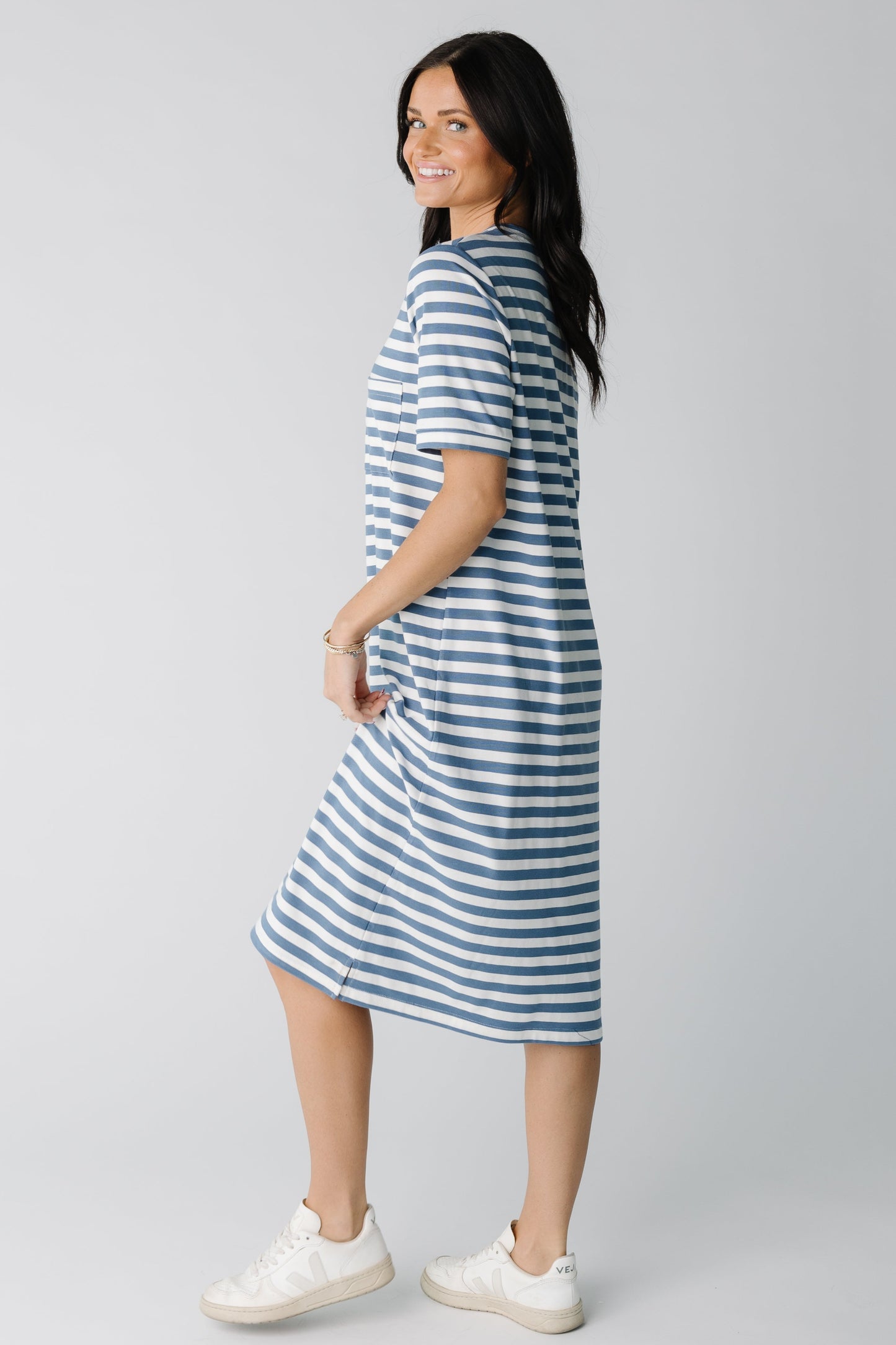 Side view of blue and white short sleeve t-shirt dress