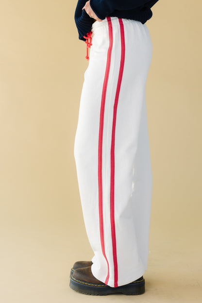 Victory Stripe Knit Pants in white with red double stripes down the leg for women & teen girls.