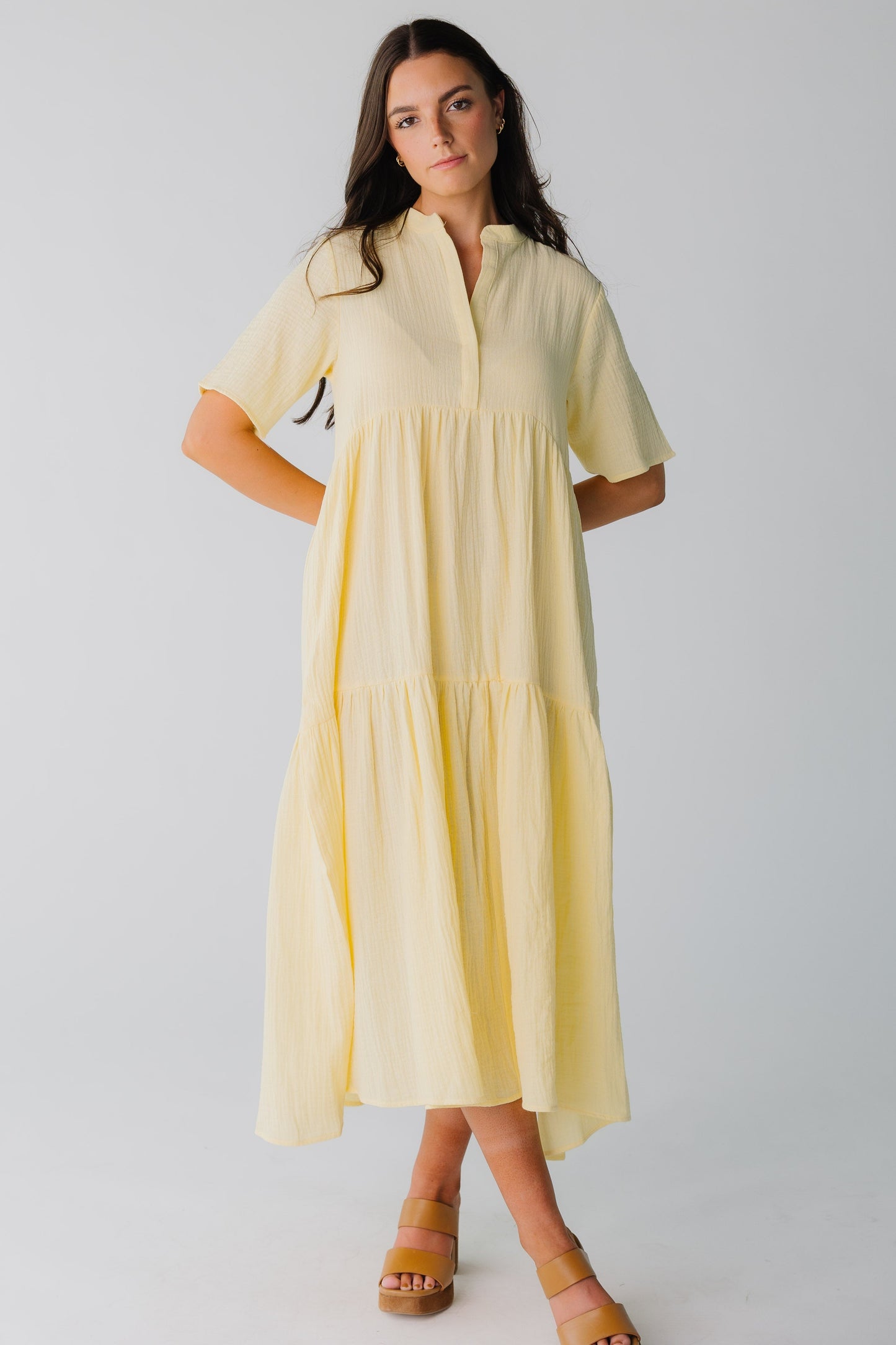 Light yellow women's midi dress with empire waist
