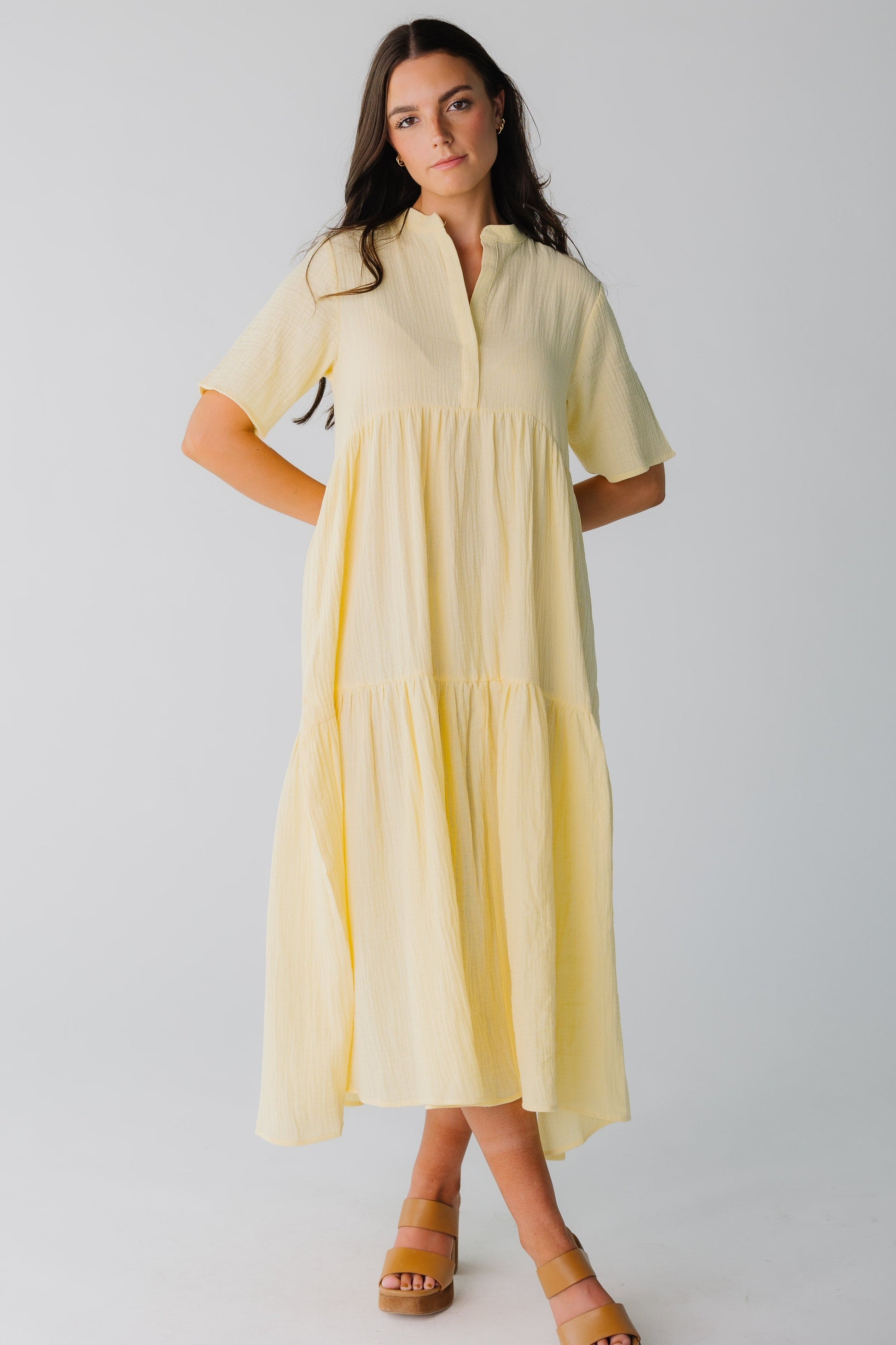 Light yellow women's midi dress with empire waist