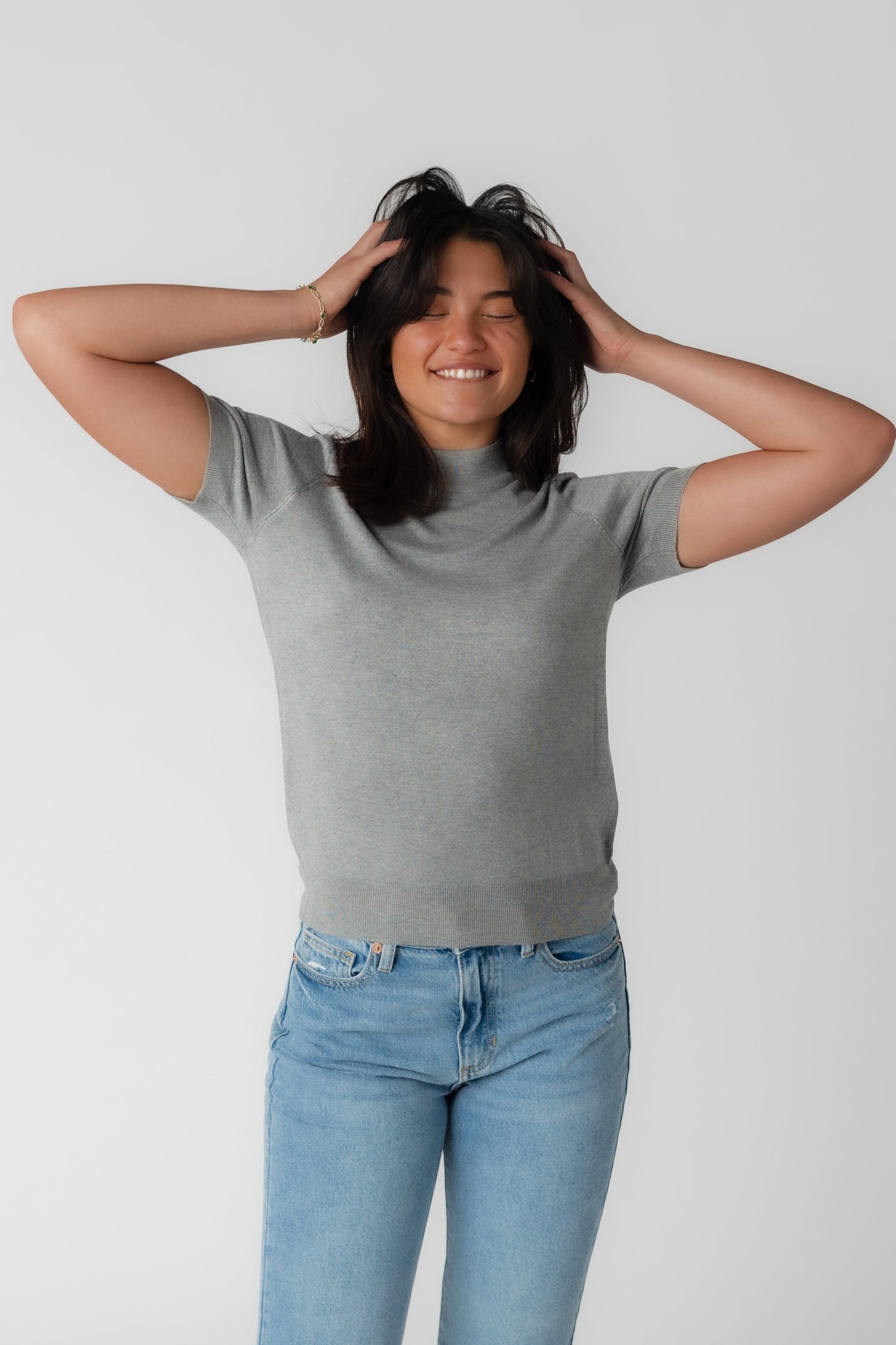 Grey mock turtleneck top with short sleeves in grey