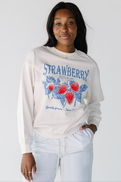 Modest long sleeve sweatshirt with crew neckline and large front graphic