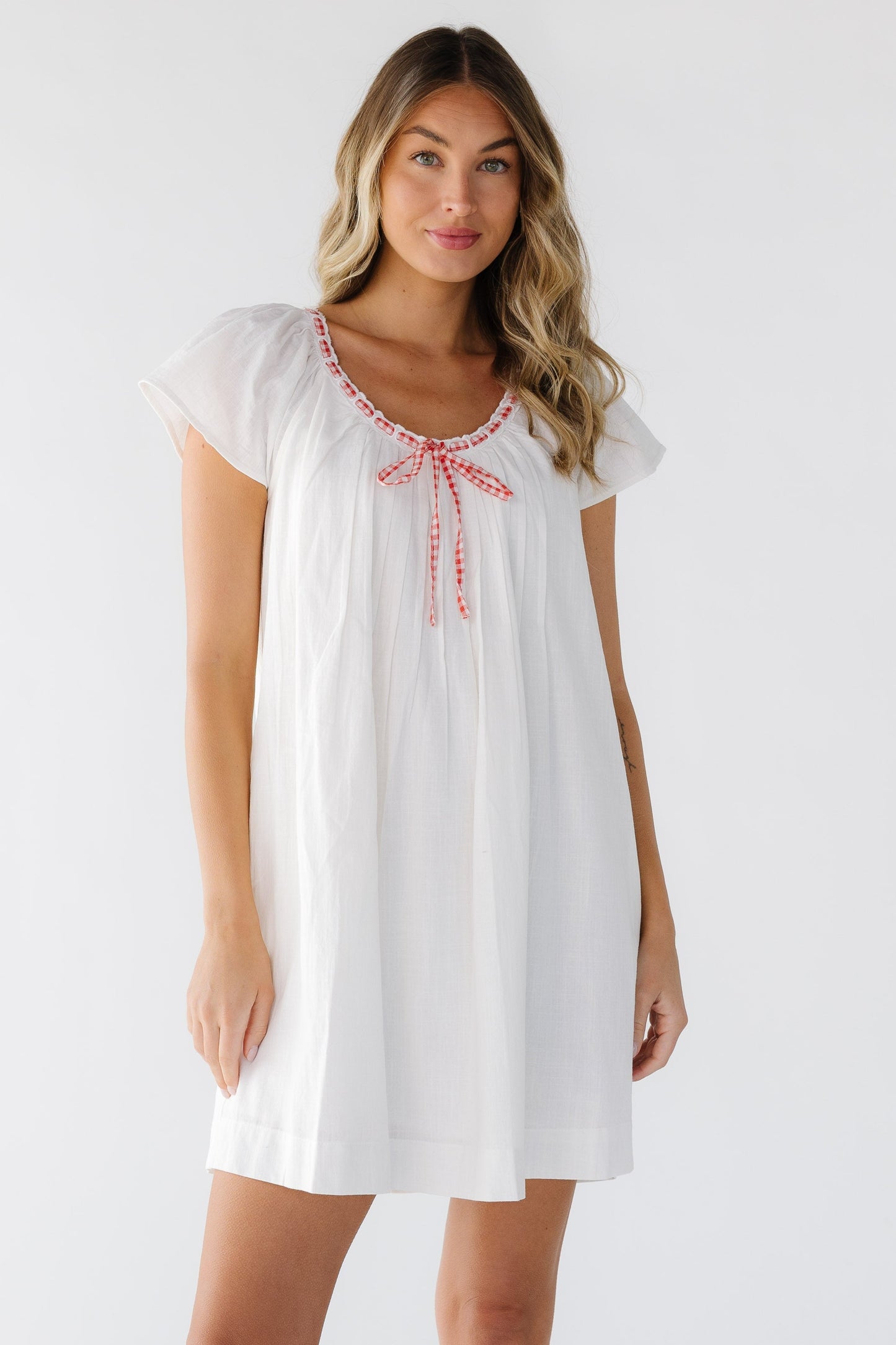 The Tandi Gingham Trim Tie Dress in white for women and teenage girls.