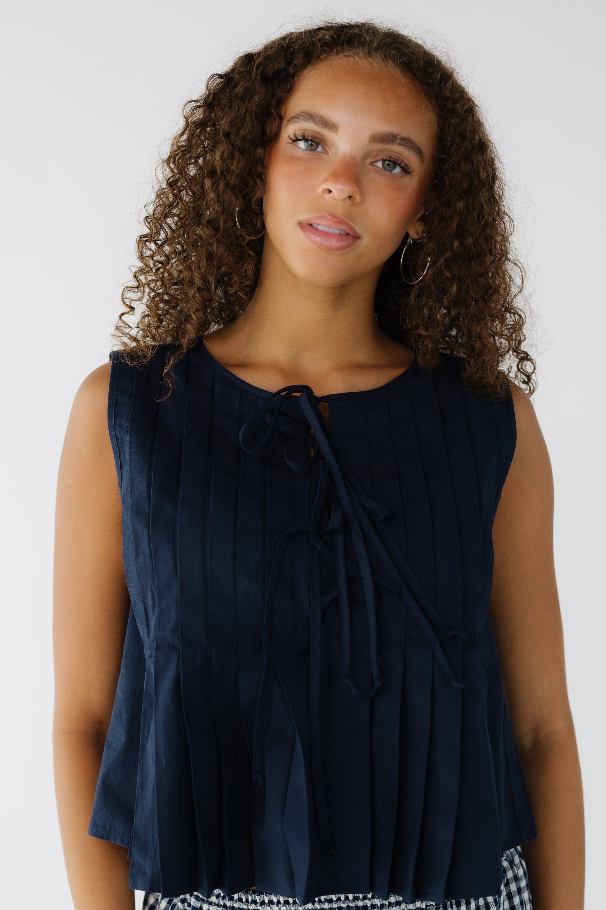 Brass & Roe Jules Flowy Top in navy for women and teenage girls.