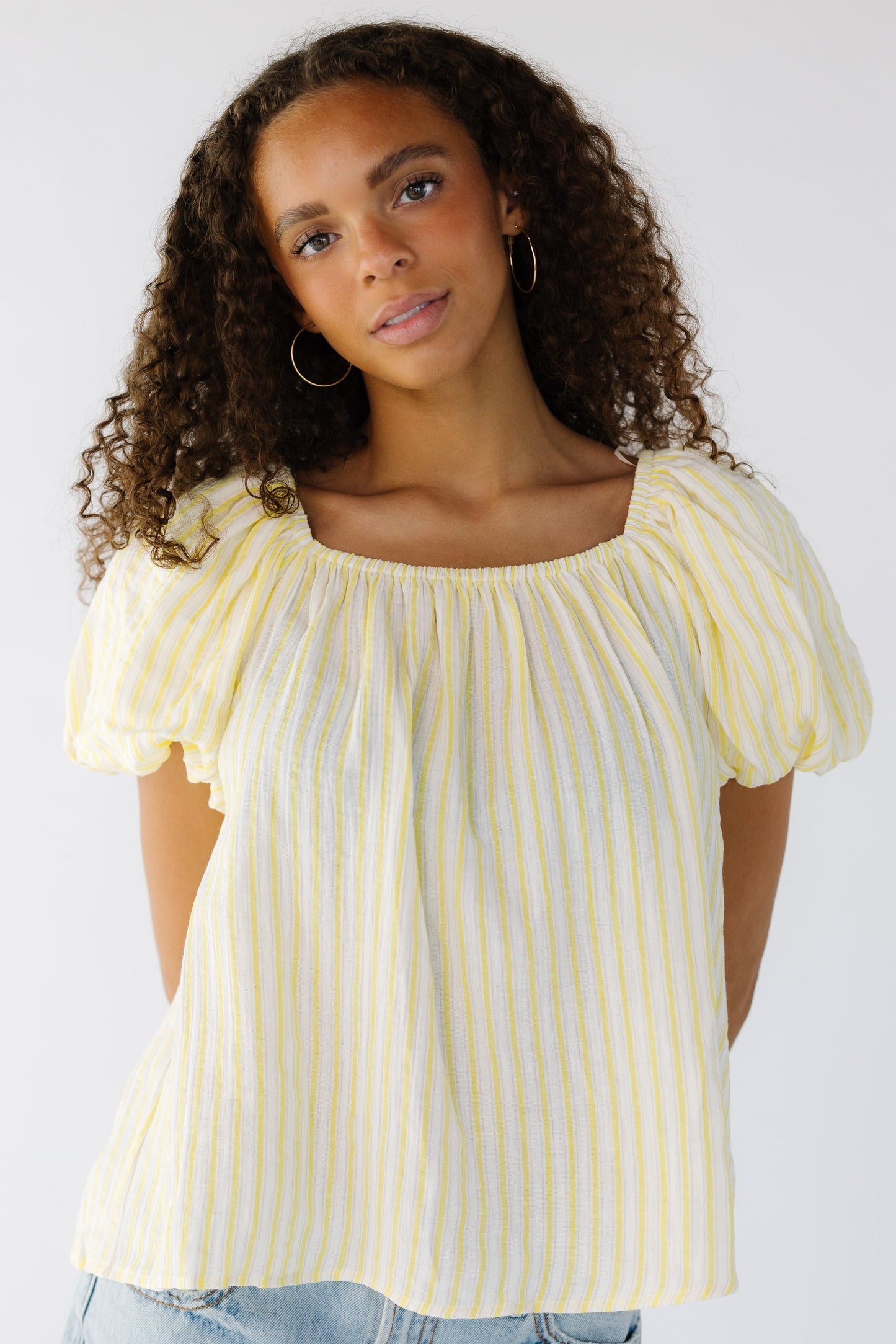 The Lottie Top in yellow and white stripe top for women and teen girls.
