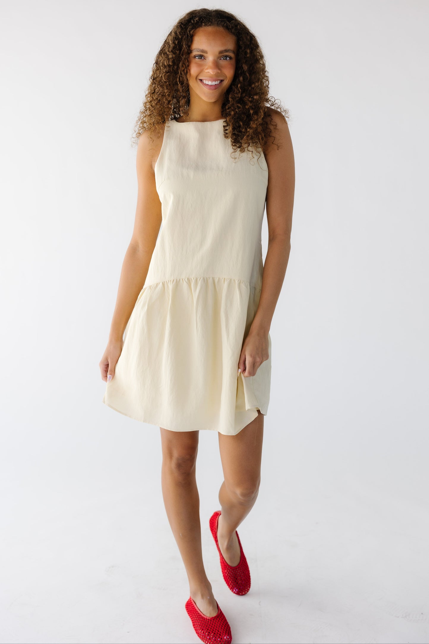 The Ella Dress in light yellow for women and teen girls.