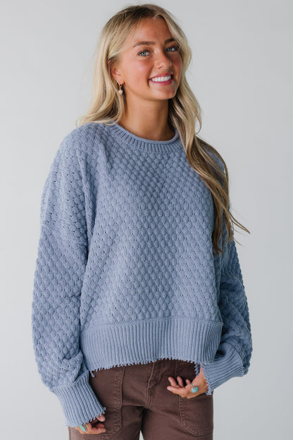 Modest blue texture knit sweater with long sleeves and rolled neckline
