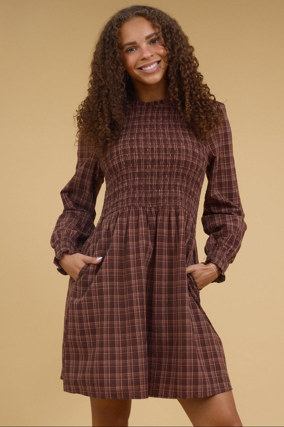 The Loft Smocked Dress in brown gingham for women and teen girls.