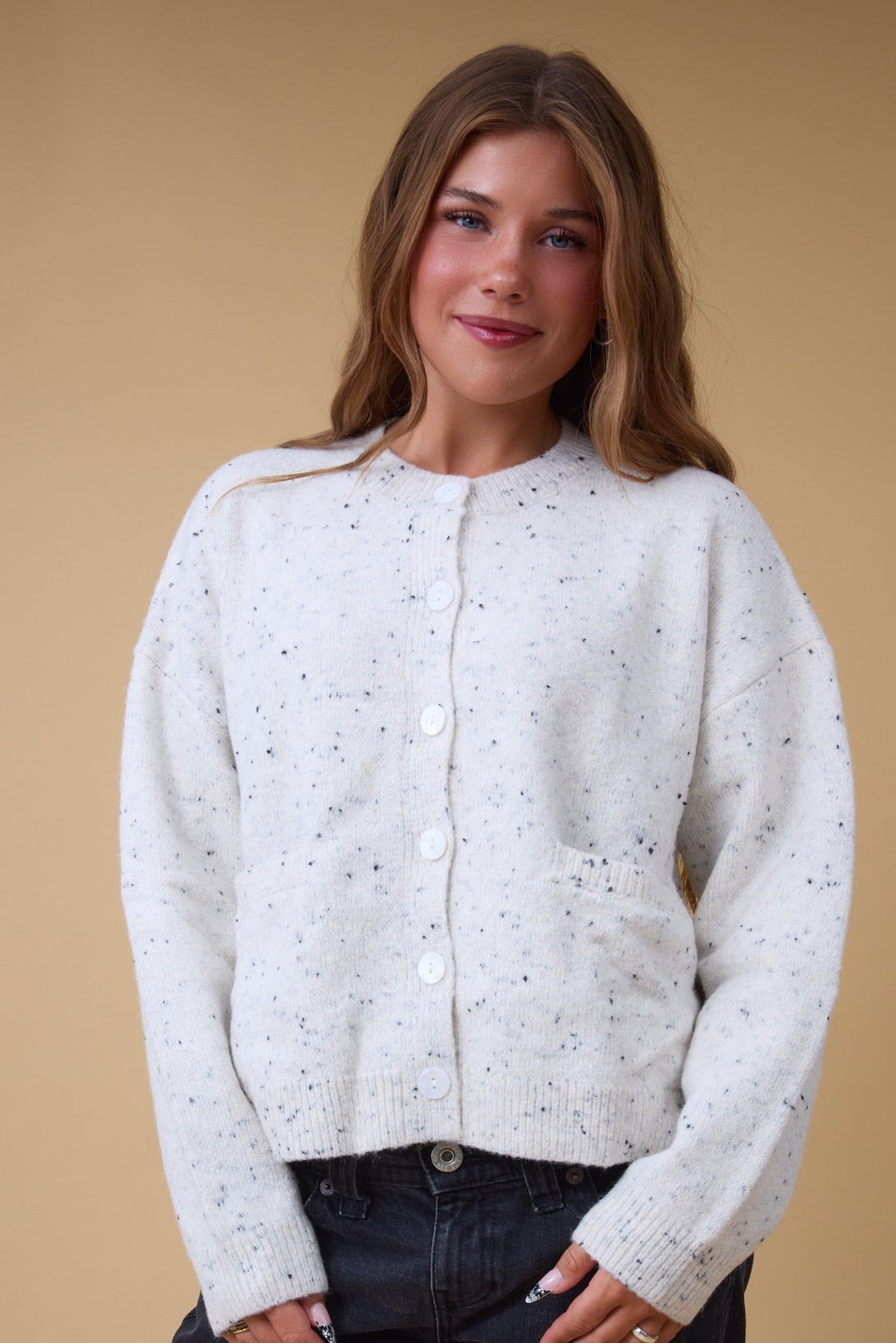 The Promise Speckled Cardigan in cream fleck for women and teenage girls.